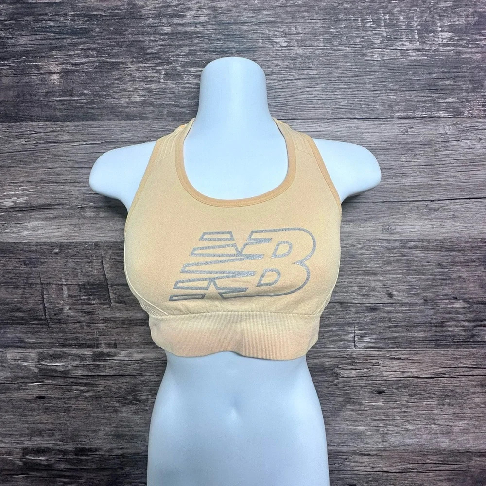 New Balance Orange Sports Bra with Racerback Design and Wide Supportive Band